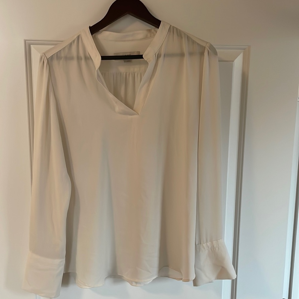 Express long sleeved blouse. Can roll sleeves up. Size large